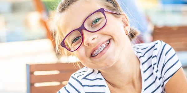 pediatric eye exam patient wearing glasses